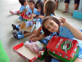 Children in Costa Rica open their Canadian-packed Operation Christmas Child shoebox gifts.  (Submitted photo)