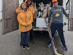 Organizers Angie and Graham McWaters with Chief Bob Chiblow of Mississauga First Nation, picking up equipment in Barrie on Octpber 15, 2022.