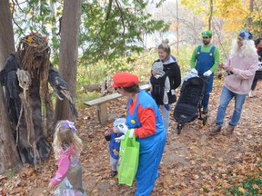 Bob Glover stands in his costume amongst the trees at Fairy Lake during Southampton's Scary Fairy Lake Halloween event that attracted hundreds on Monday, October 31, 2022.