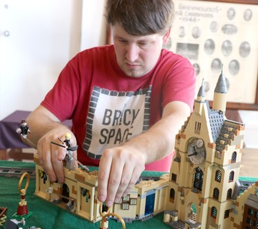 Derek Pearce, owner of The Brickspace, sets up a Harry Potter Lego display at Sault Ste. Marie Museum on Saturday, Oct. 29, 2022 in Sault Ste. Marie, Ont. (BRIAN KELLY/THE SAULT STAR/POSTMEDIA NETWORK)