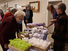 Members of the Ripley and District Horticultural Society shop for lavender products following Cathy Kirk’s presentation.