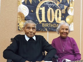 John Olbey, who died Oct. 24, is seen here on Feb. 27, 2022 celebrating his 100th birthday with his wife, Olive, at the WISH Centre in Chatham. File photo/Postmedia