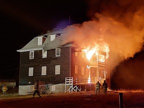 The abandoned rectory in Fort Chipewyan burns on Oct. 30, 2022. Supplied Image/Paul Grandjambe