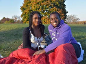 SWEET SPOT: Londoners Audrey Esemezie and Divine Nwaokocha picked a perfect spot for a weekend picnic.  The west end's Scenic View Park is high above the city with a beautiful backdrop of autumn foliage. (BARBARA TAYLOR/Postmedia Network)