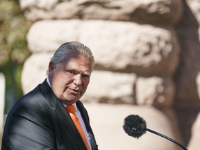 Ontario Premier Doug Ford speaks at a ceremony for the unveiling of the Platinum Jubilee Garden at Queen's Park, in Toronto, on Friday, Sept. 30, 2022. THE CANADIAN PRESS/Alex Lupul