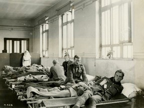 Recently arrived wounded soldiers at No.1 Canadian Casualty Clearing Station, July 1916. Doctors knew little about shell shock, and treatments ranged from the compassionate to near-torture. (George Metcalf Archival Collection CWM 19920044-385 O.428 © Canadian War Museum)