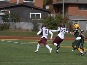 Caleb Grant of the Algonquin Barons heads to the end zone in the 2nd quarter of the Barons-Bears clash.