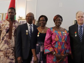 Burkina Faso officials join Kevin McCormick (second from the right), the 2022 recipient of the Knight of the Order of the Stallion, during a private investiture ceremony at the Embassy of Burkina Faso in Ottawa. Supplied