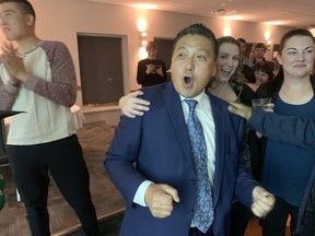 Simon Yu reacts after being elected the next mayor of Prince George.