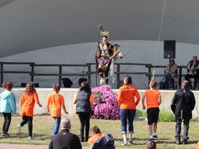 Boomer Keewatin leads the crowd in a traditional First Nations dance on National Day for Truth and Reconciliation in Fort Saskatchewan.