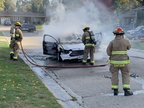 Brantford firefighters put out a car fire on Conklin Crescent.