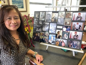 Violy Stevens shows a photo board depicting her ex-husband, Rodger Kotanko at various stages of his life, at a celebration held Sunday to remember Kotanko, who was shot and killed near Port Dover last year by a Toronto Police officer.