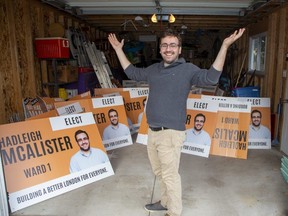 Hadleigh McAlister has a garage full of campaign signs on Tuesday, Oct. 25, 2022 the day after defeating Ward 1 incumbent Michael Van Holst in the municipal election in London, Ont. (Derek Ruttan/The London Free Press)
