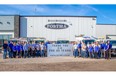 Postma Heating and Cooling staff gather outside their recently expanded facility to thank the community for 30 years of support. Supplied