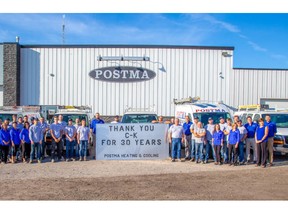 Postma Heating and Cooling staff gather outside their recently expanded facility to thank the community for 30 years of support. Supplied