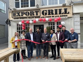 Export Grill's new owners,  Rakesh Parmar, Harshil Parikh and Jay Dordi were joined by Downtown District BIA Executive Director Luisa Sorrentino, Mayor Mitch Panciuk, MPP Todd Smith, Jill Raycroft on behalf of MP Ryan Williams, Councillor Bill Sandison, and Anthony Calaghan from the Belleville Chamber of Commerce for an official ribbon cutting and grand re-opening ceremony on Saturday. SUBMITTED PHOTO