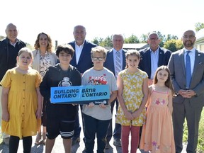 The Algonquin and Lakeshore Catholic District School Board (ALCDSB) has received approval from the province for the acquisition of land in Picton's west end for a new St. Gregory Catholic School site. Pictured at the announcement (in front from left) are students from the grade 4/5 class at St. Gregory Catholic School. Leah, Antonio, Isaac, Emma, Millie. in the back row (from left) are: Dave Cleave, developer, Ms. Thomlinson, principal of St. Gregory Catholic School, MPP Todd Smith, Tom Dall, chairman of the board for the ALCDSB, PEC Mayor Steve Ferguson and ALCDSB director of education, David DeSantis.
