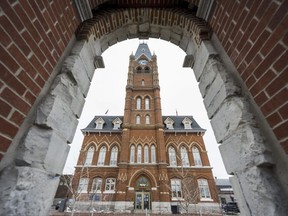 Belleville city hall is seen framed in an archway of the Cablevue Facade on an overcast Thursday in Belleville, Ontario. ALEX FILIPE
