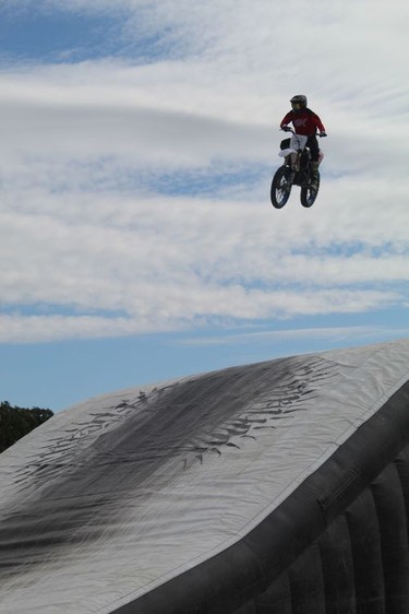 A rider flies through the air during the freestyle motocross event on Sunday at the Burford Fair. Michelle Ruby