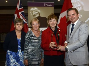 Bite of Brant volunteers, represented by Janet Licskai (left), Dorothy Donkers and Jean Emmott, receive a June Callwood Outstanding Achievement Award from the Ontario Ministry of Citizenship and and Multiculturalism at a ceremony in Toronto. Presenting the award is Graham McGregor, parliamentary assistant to the minister of citizenship and multiculturalism. Submitted Photo