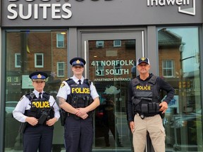 Insp. Jodi Kays, detachment commander Norfolk OPP, Staff Sgt. Jeff McNorgan and community mobilization officer Jason Eberley stand outside the OPP's extended service office in Indwell - Dogwood Suites in downtown Simcoe. Submitted