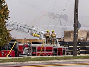 Fire crews continue to battle a blaze at North West Rubber on Henry Street in Brantford over the noon hour Wednesday.