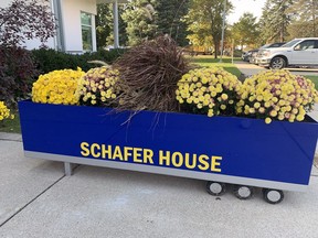 A floral display greets visitors to the Schafer House, the former Delhi Research Station which has been transformed into apartments for Ukrainian families who have come to Norfolk County to get a new start following the invasion of their homeland by Russian forces.  Vincent Ball