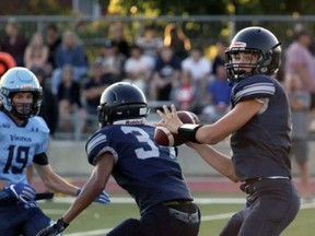 Assumption College senior football quarterback Tyson Kemp, shown here in an exhibition game from earlier in the season, led the Lions to a 7-5 win over Brantford Collegiate Institute on Thursday in Athletic Association of Brant, Haldimand and Norfolk quarter-final playoff action.