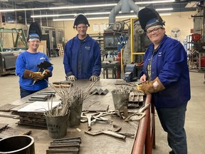 Rob Bonifacio (center), a welding instructor at Six Nations Polytechnic in Brantford stands with Women of Steel students Julie Herron (left) and Crystal MacKay.  SUBMITTED PHOTO