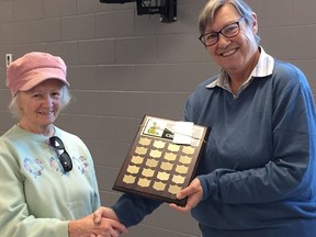 Jan McLean (left) receives the prize for highest score in the 2022 Dragon League from St. George Lawn Bowling Club president Lesley Durham-Macphee. Submitted