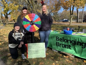 Jenna Nieman (left), Jocelyn Birkes and Tara Buchanan of Belonging Brant attend the official opening of the Preston Park playground on Saturday. Belonging Brant is a three-year initiative that helps people in community connect with those with similar passions and gifts. The program is funded by the Ontario Trillium Foundation.