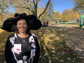 Karen DeGrandis, of the Holmedale Neighborhood Association, was one of many people to wear a costume at the Halloween-themed official opening of the Preston Park playground on Saturday.  Vincent Ball