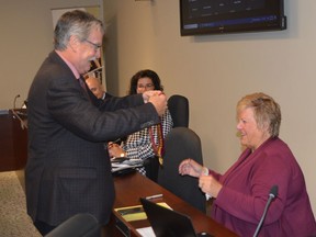 Leeds and Grenville Warden Roger Haley presents his chain of office to Honorary Warden Lesley Todd during a counties council meeting on Thursday, Oct. 20.
Tim Ruhnke/Postmedia Network