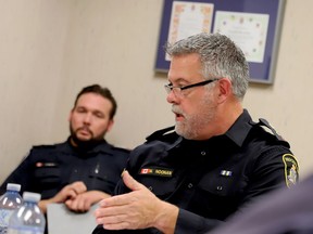 Brockville Police Chief Mark Noonan speaks at Tuesday's police services board meeting, while Staff Sgt. Darryl Boyd listens. (RONALD ZAJAC/The Recorder and Times)