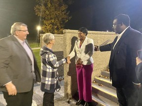 Cornwall councillors-elect. Denis Sabourin, left, and Fred Ngoundjo, right, introducing their respective partners outside of the civic complex on Monday October 24, 2022 in Cornwall, Ont. Shawna O'Neill/Cornwall Standard-Freeholder/Postmedia Network