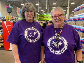 FreschCo employees Linda Taillon (left) and Lydia Hart on Dress Purple Day. Photo on October 27, 2022, in Cornwall, Ont. Todd Hambleton/Cornwall Standard-Freeholder/Postmedia Network
