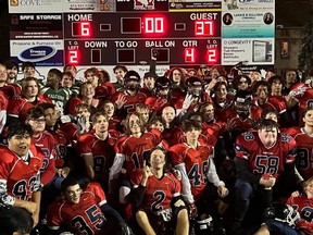 The St. Joseph's Panthers, with some of their Falcons opponents, gathering in the endzone after the Charity Bowl. Photo Thursday, October 27, 2022, in Cornwall, Ont. Todd Hambleton/Cornwall Standard-Freeholder/Postmedia Network