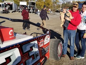 Young James Marcotte got a close up view of the racing cars while visiting the Cornwall Motor Speedway's Canadian Super DIRT Weekend with parents Davey and Melissa Marcotte on Sunday October 9, 2022 in Cornwall, Ont. Greg Peerenboom/Special to the Cornwall Standard-Freeholder/Postmedia Network