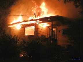 The fire at 1538 Joyceville Rd. on Oct. 21, 2001. Once the fire was extinguished, first responders found Stephen St. Denis dead inside.