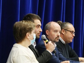 Kingston mayoral candidates, from left, Tina Fraser, Skyler McArthur-O'Blenes, incumbent candidate Bryan Paterson and Ivan Stoiljkovic meet at their only in-person debate at Bayridge Secondary School on Wednesday.