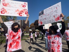 Performers participated in an art demonstration on Saturday in Confederation Park in solidarity with anti-government protests in Iran following the death of a 22-year-old-woman while in police custody.