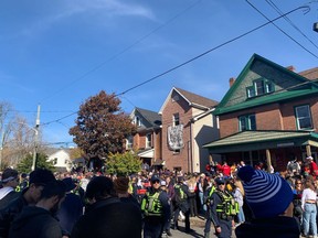 Kingston Police declared a nuisance party as partygoers gathered on Aberdeen Street on Saturday afternoon for the second weekend of Homecoming parties. Brigid Goulem/The Kingston Whig-Standard/Postmedia Network