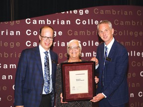 Photo provided by Cambrian College and used with permission
Cambrian College president Bill Best and vice-president Shawn Poland thanked the institution’s many contributions on Thursday with a special presentation to the family of Kenneth Russell, acknowledging his contributions to the founding health science programming at the college. His daughter, Rosalind Russell, was presented with a special commemoration certificate acknowledging her father’s contributions. A resident of Espanola and Manitoulin Island in his twilight years, Russell died on Sept. 14 at the age of 88. Domtar and other supporters also received accolades.