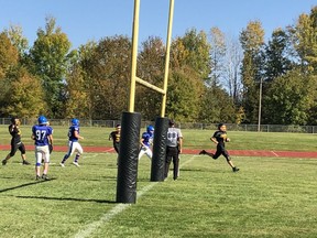 Fellowes quarterback Charlie Chuback crosses the goal line after scoring a first quarter touchdown against the Renfrew Raiders.