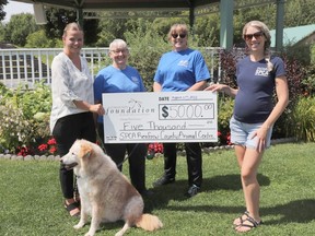 The Ontario SPCA Renfrew County Animal Centre recently received a grant of $5,000 from the Pembroke Petawawa District Community Foundation. The grant money this year will be used to host another Mobile Animal Wellness Clinic. The Ontario SPCA and Humane Society's 38-foot SPCA Mobile Animal Wellness Services unit previously rolled into Renfrew County in July to host a much-needed spay/neuter clinic for cats from underserved pet families. This successful mobile event was made possible thanks to the generosity of Pembroke Petawawa District Community Foundation and Pet Valu Petawawa, who sponsored the event. To learn more about Ontario SPCA Mobile Animal Wellness Services, visit ontariospca.ca/mobileservices. Taking part in the donation was, from left, Jamie Berry, Pembroke Petawawa District Community Foundation community liaison, and from the OSPCA, Lea Thompson, pup foster, Sharlene Tracy, and Amanda Eckersley, centre manager.
