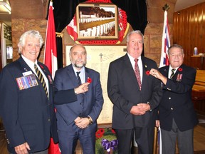 The first poppies of the Pembroke Legion's 2022 Poppy Campaign were recently presented ahead of the campaign which starts Oct. 28. Taking part in the presentation of the poppies were, from left, Branch 72 Poppy Campaign chairman Romeo Levasseur, Pembroke Deputy Mayor Ron Gervais, Laurentian Valley Councillor Allan Wren, and Branch 72 President Stan Halliday. Anthony Dixon
