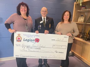France Ducharme (left), Principal at École catholique La Renaissance, and Syndy Withers, Principal at Sacred Heart School, were on hand to gratefully accept the big cheque from Legion Branch 39 President Gary MacPherson. Supplied
