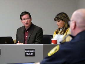 Paul Wiersma, chairing the Sarnia police services board's meeting in the absence of Mike Bradley, asks Chief Derek Davis a question during Tuesday night's session at headquarters. (Terry Bridge/Sarnia Observer)