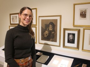Curator Sonya Blazek is shown with part of the first of a series of six Re View exhibitions opening Nov. 4 at the Judith & Norman Alix Art Gallery in downtown Sarnia to mark its 10th anniversary.  The exhibitions will continue over the coming year and a half.  (PAUL MORDEN/The Observer)