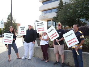 Participants take part in the Greater Sudbury is Failing us Rally outside Tom Davies Square in Sudbury, Ont. on Tuesday October 4, 2022. John Lappa/Sudbury Star/Postmedia Network
